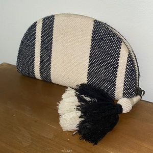 Black and cream woven clutch